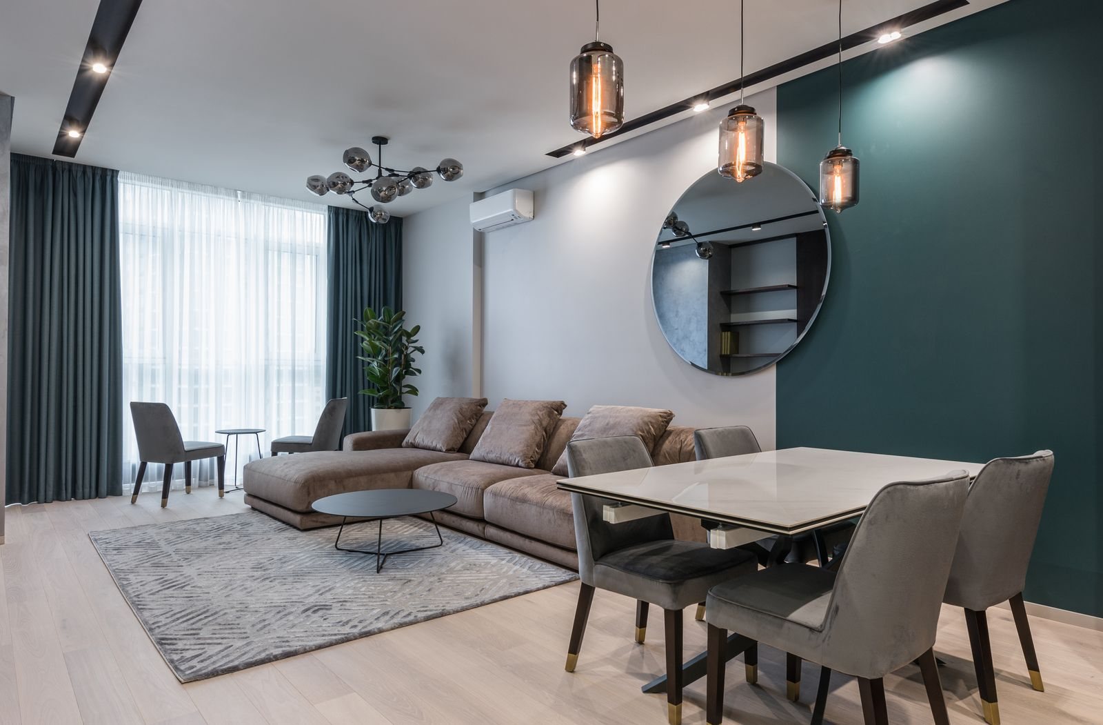 Render del living comedor de un dos ambientes, con cocina integrada.